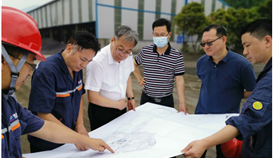 首钢国际总司理侯俊达一行到公司考察交流